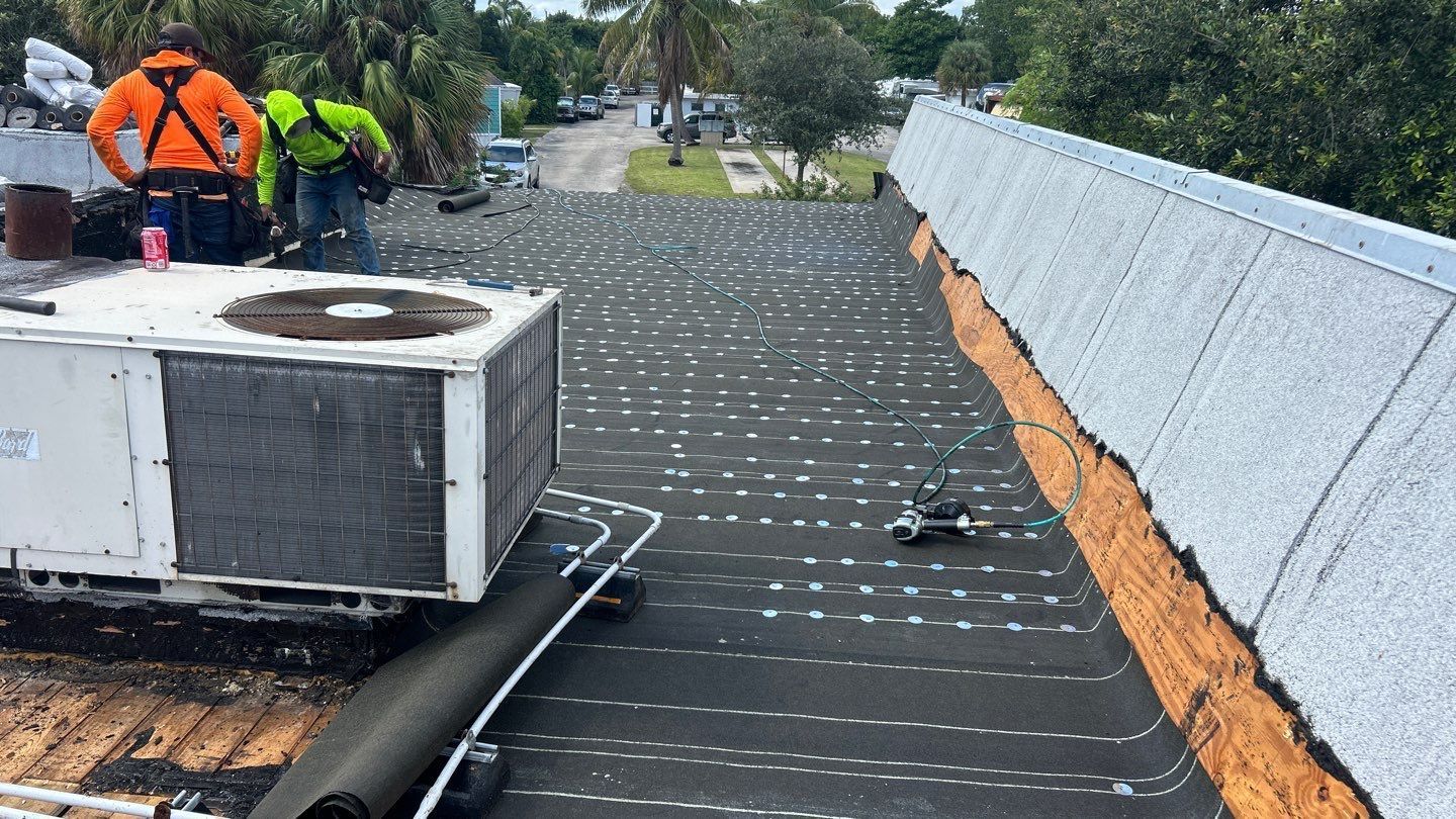 EPDM roofing installation on commercial building in Deerfield Beach FL