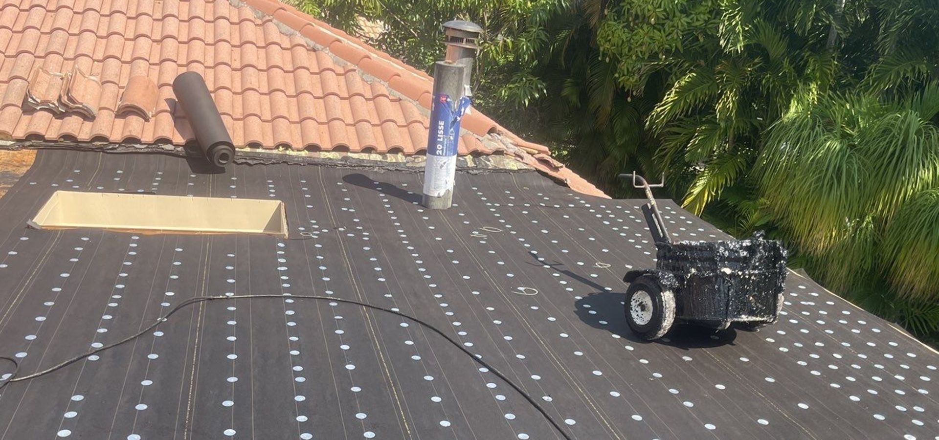Underlayment installation during roof replacement in Plantation FL