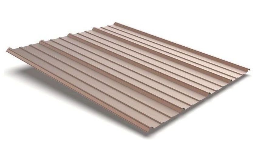 A brown metal roof is laying on a white surface.