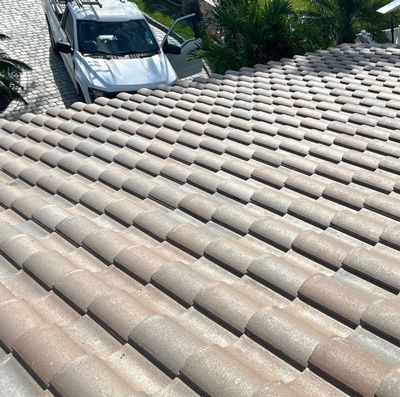A close up of a roof with waves on it