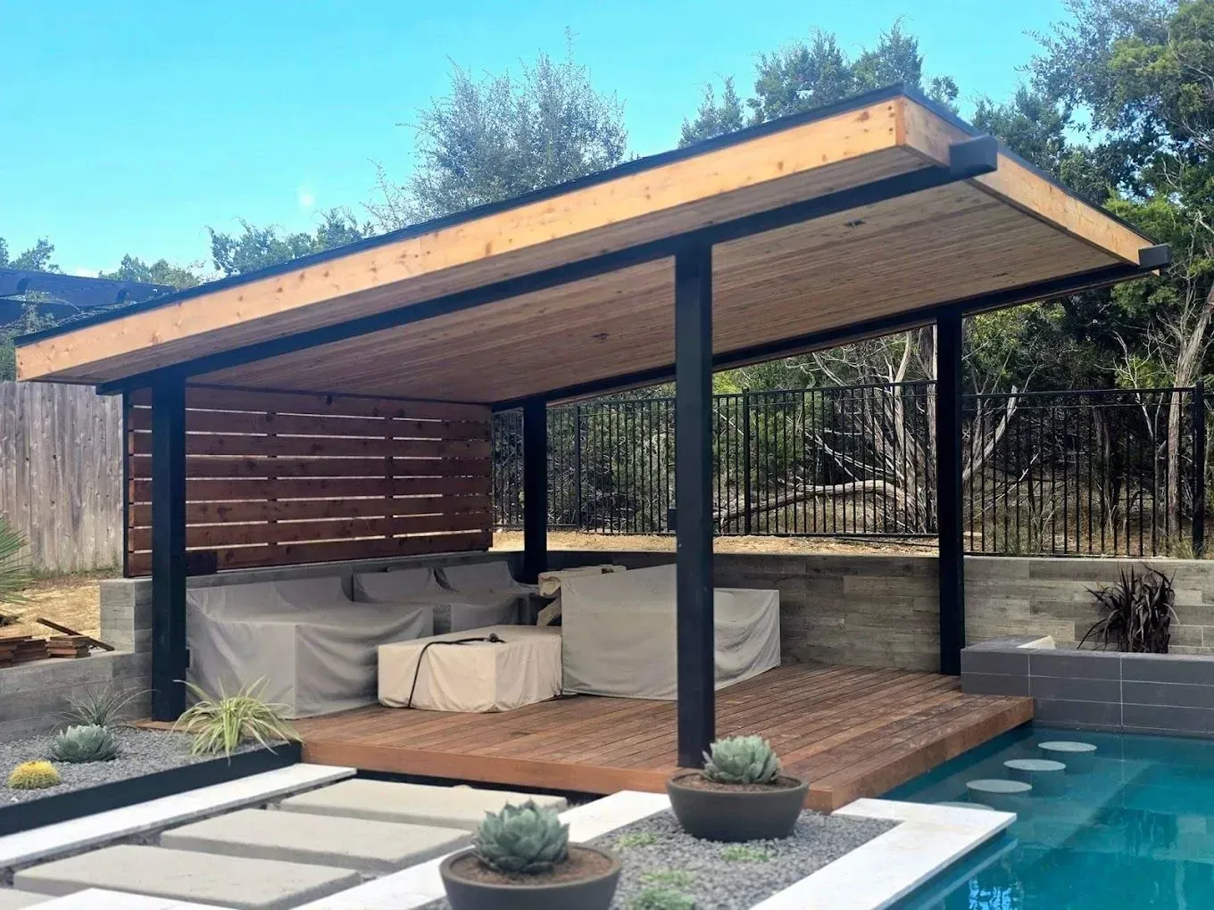 Modern poolside wood gazebo.