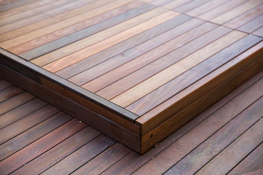 Modern gray composite deck with railing.