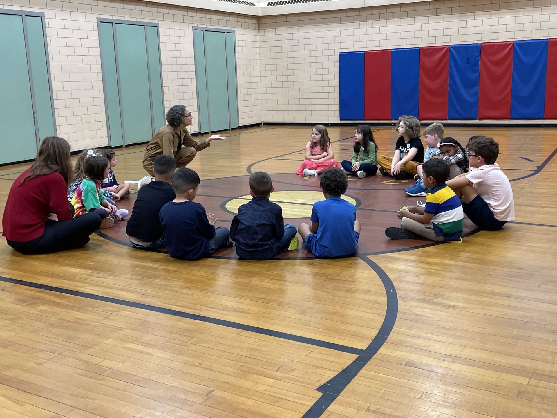 Montessori children seating in a circle