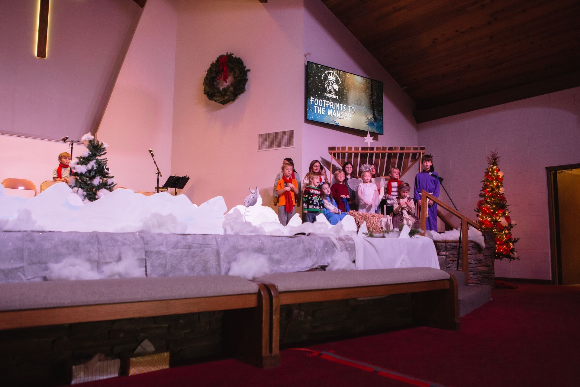 Children performing on stage 