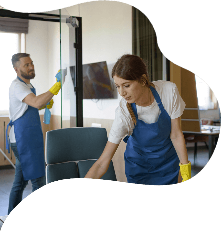 A man and a woman are cleaning a room.