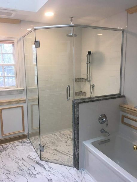 Glass Shower Door Installed in Corner of Local Bathroom