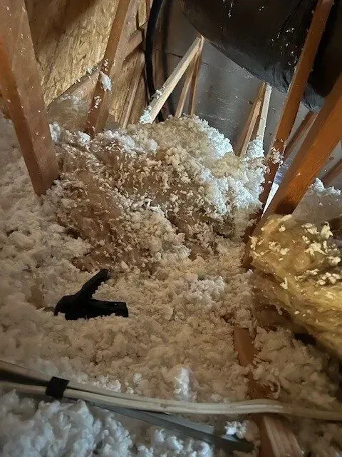 There is a lot of insulation in the attic.