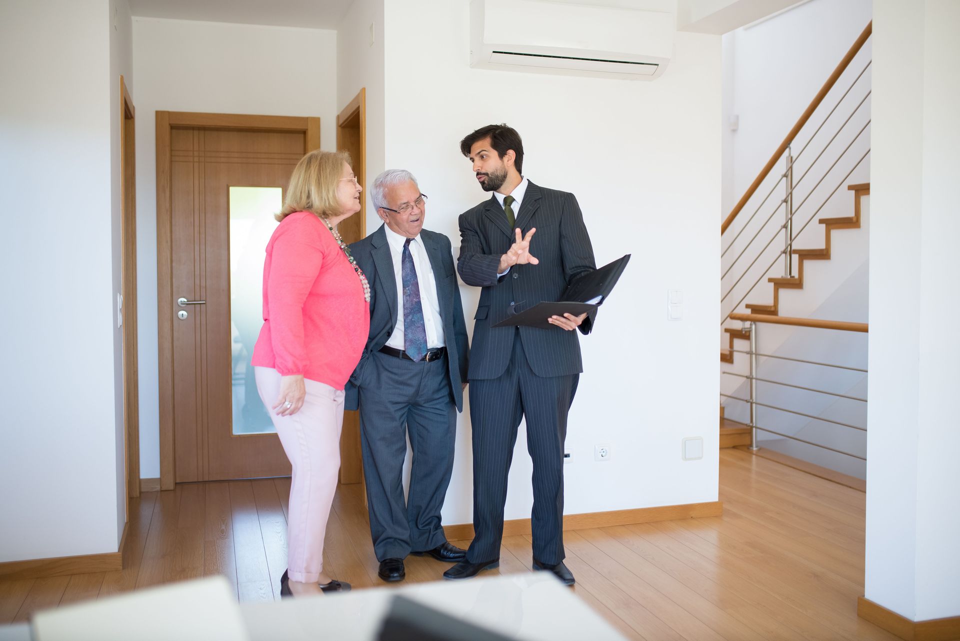 Ohio homebuyer family receiving keys to new home with mortgage lender after closing on Ohio home loan