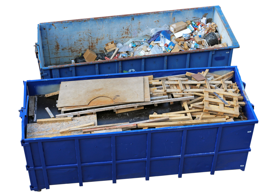 Two blue dumpsters filled with wood and trash on a white background