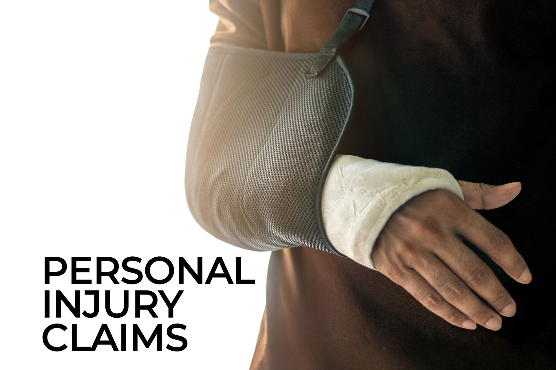 Injured worker with arm in a sling and bandaged wrist representing a workplace injury claim in Bambe