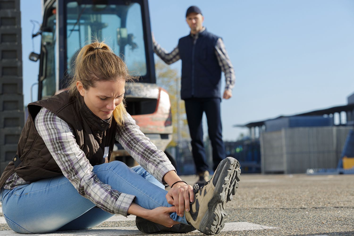 A woman with a sprain at work. A woman with a sprain at work.