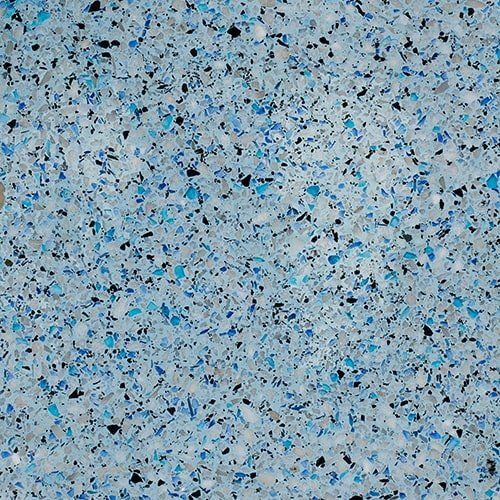 A close up of a blue and white granite counter top.