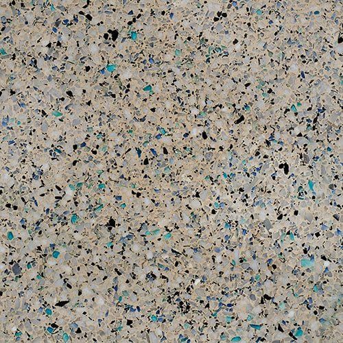 A close up of a surface with a lot of small stones on it.