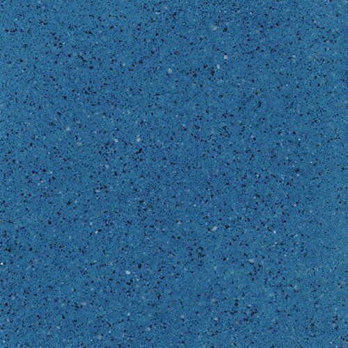 A close up of a blue granite counter top.