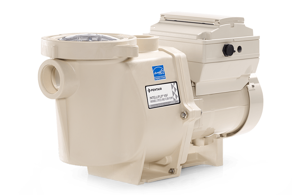 A white swimming pool pump is sitting on a white surface.