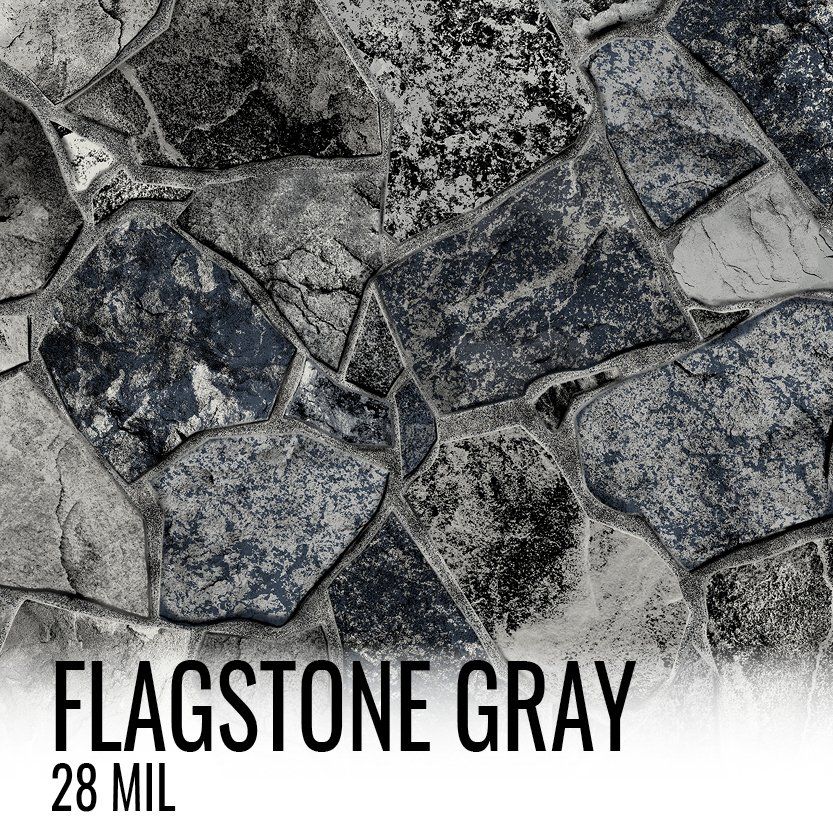 A picture of a flagstone gray stone wall.