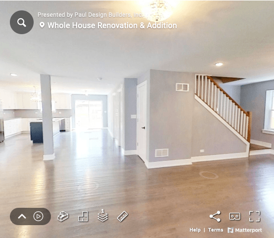 A virtual tour of a house with a staircase