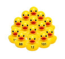Stack of yellow rubber ducks, some with black numbers printed on them.