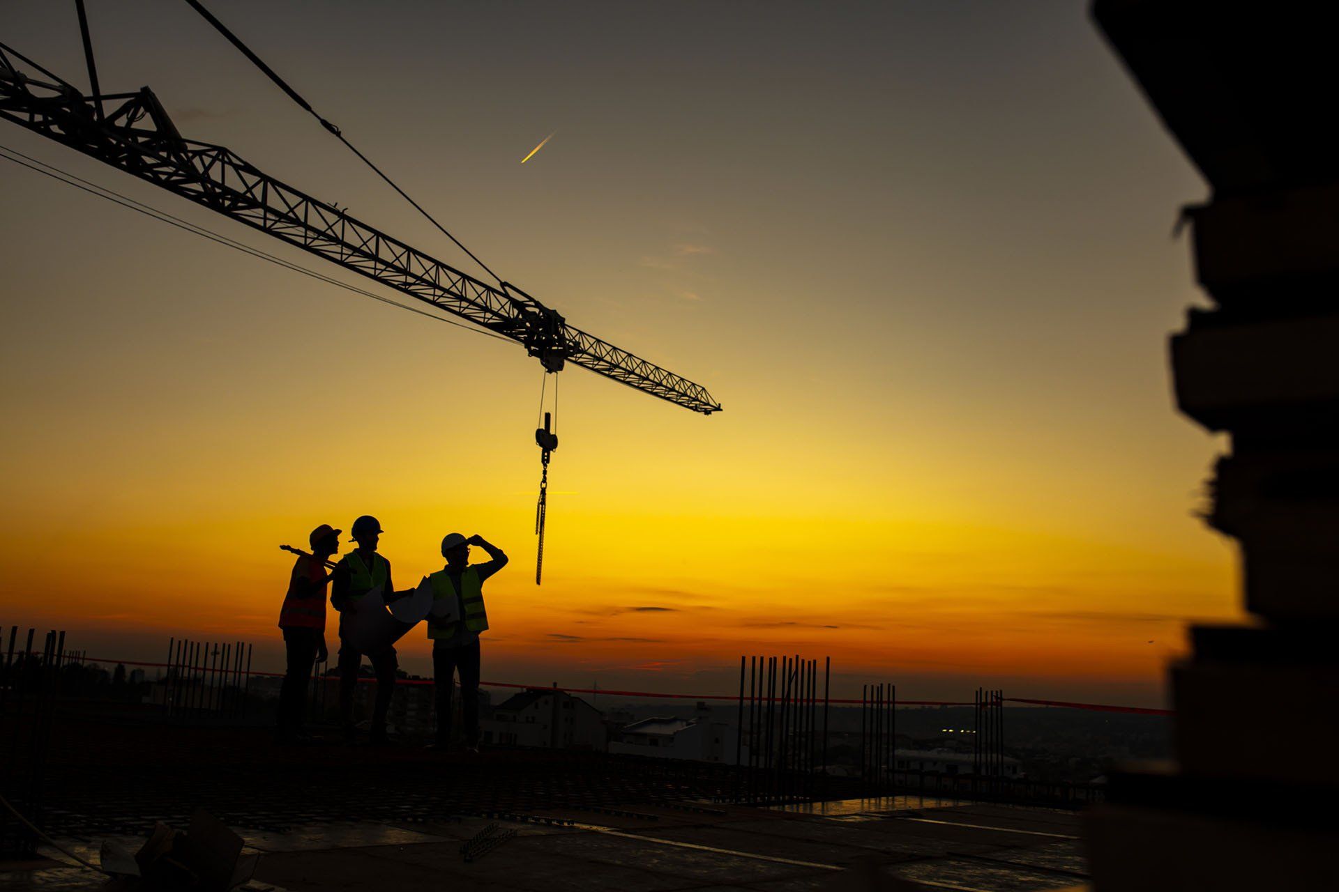 Construction Workers at Sunset — Gainesville, FL — Moody Salzman Lash & Locigno