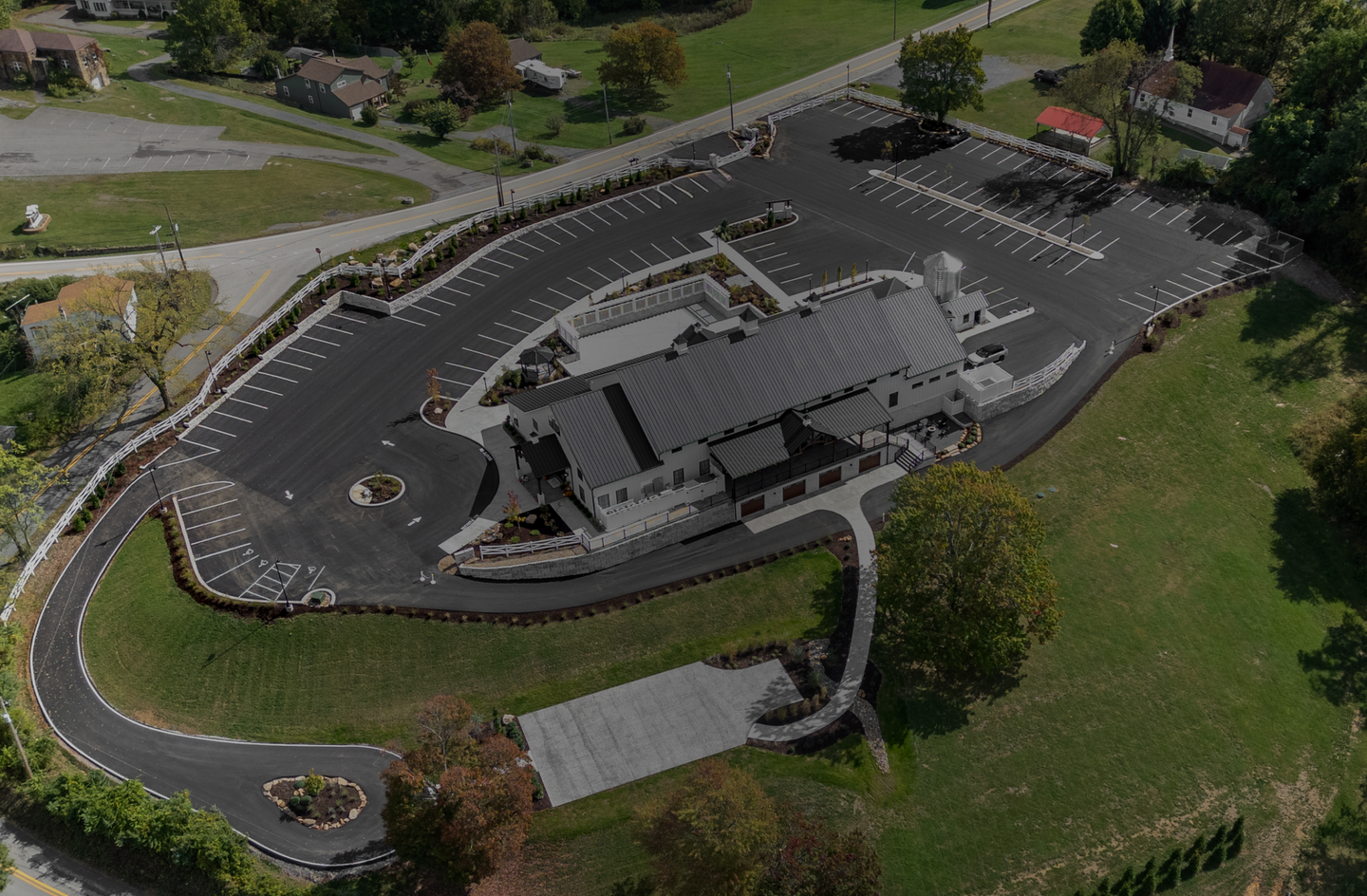 Aerial view of White Oak 1838, and surrounding green lawns.