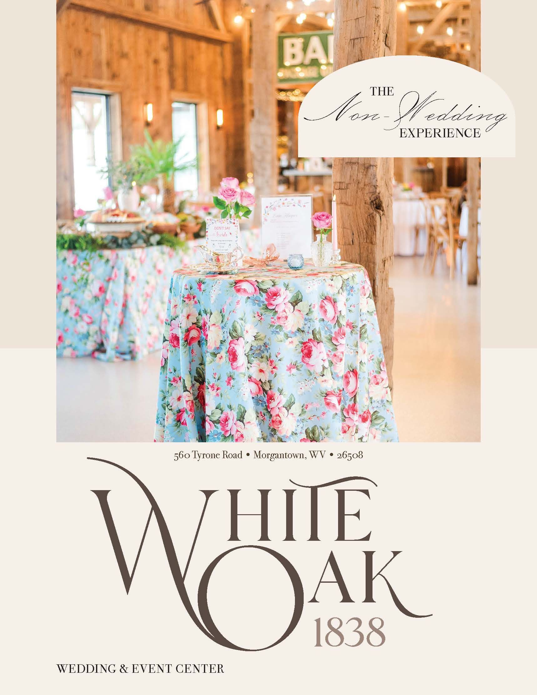 White Oak 1838 event table with floral cloth in a bright rustic venue - The Non-Wedding Experience