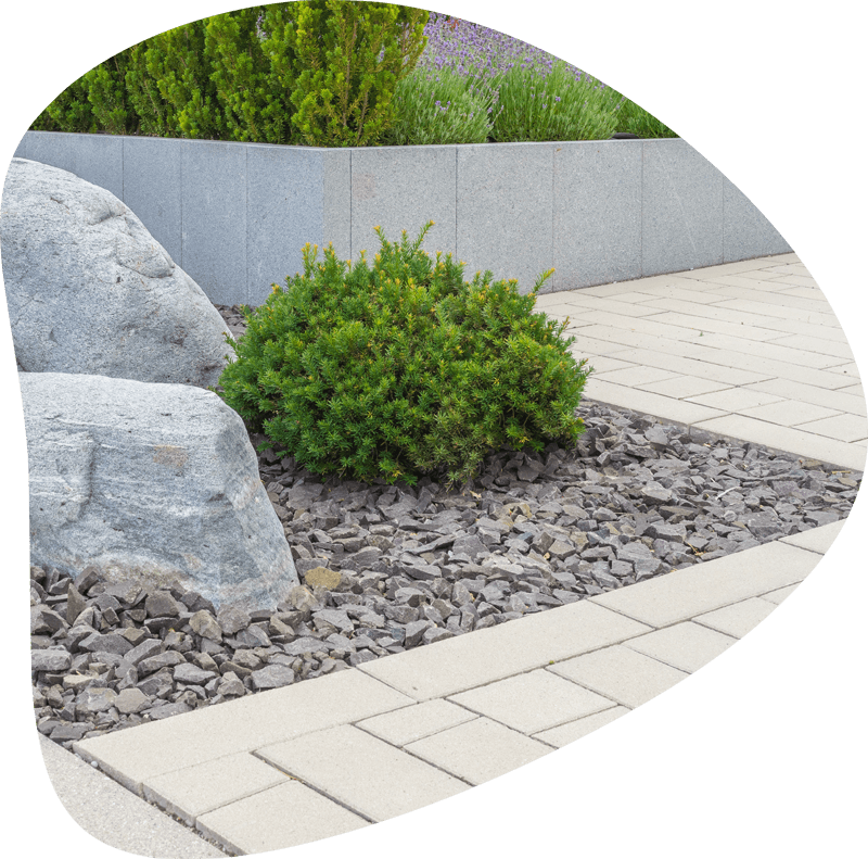 concrete pavers and plant box in garden landscape