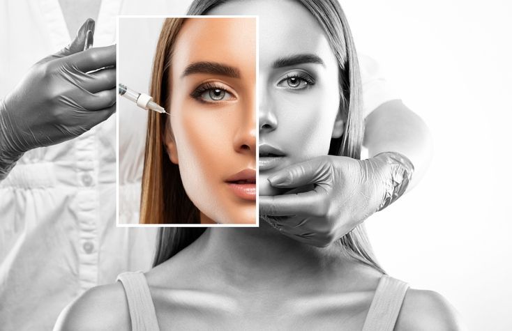 a woman is getting a botox injection in her face .