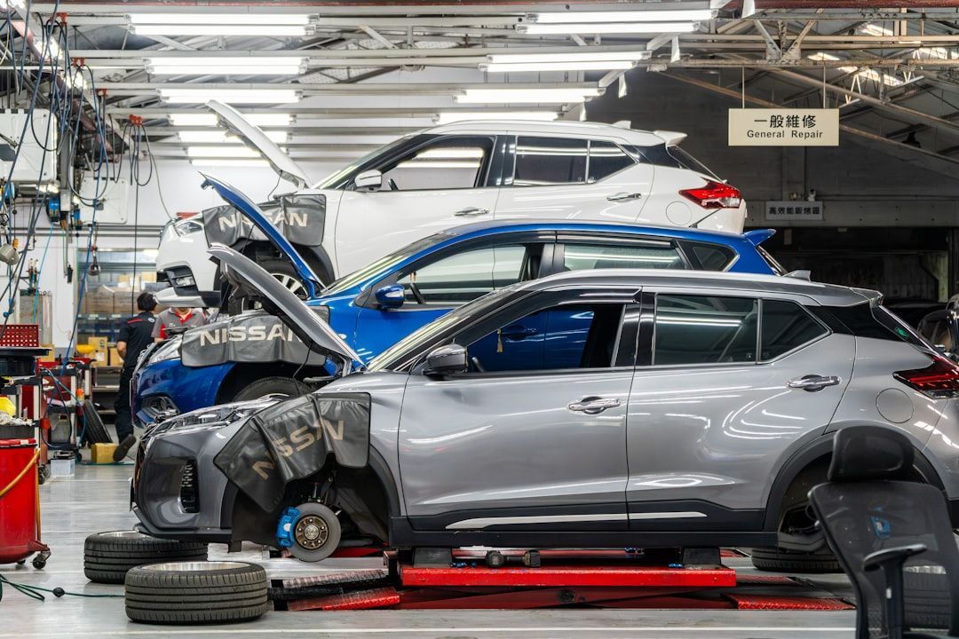 Digital marketing for auto repair shops with cars in a repair garage.