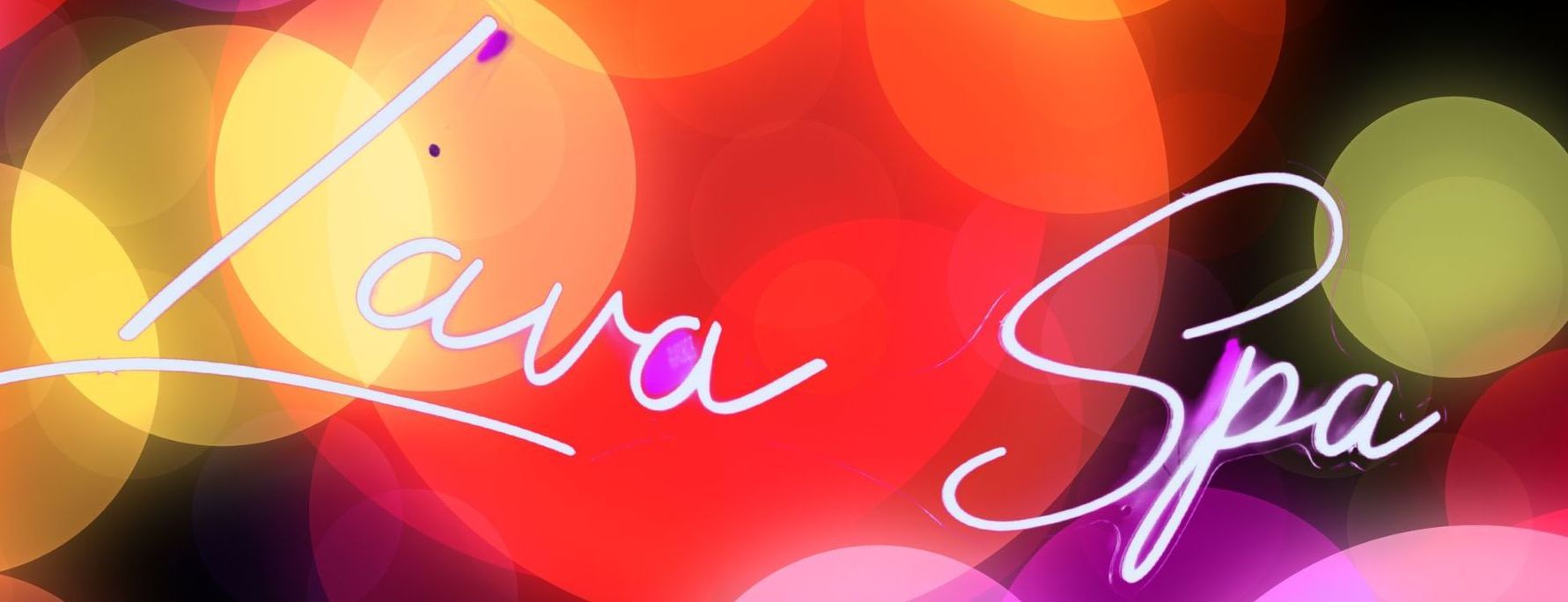 Lava Spa logo in white script over a colorful glowing bokeh background