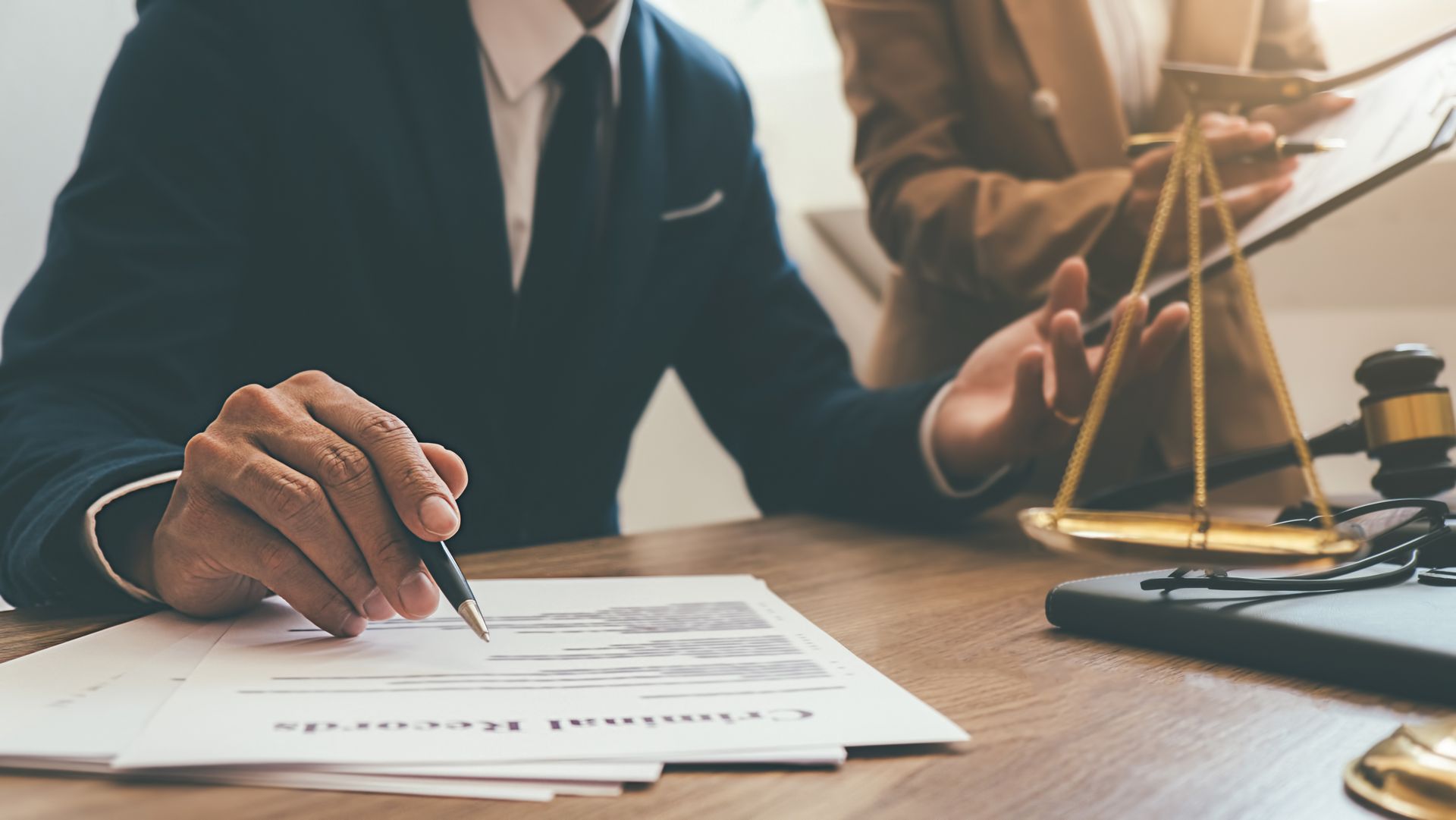 Solicitor reading paper work