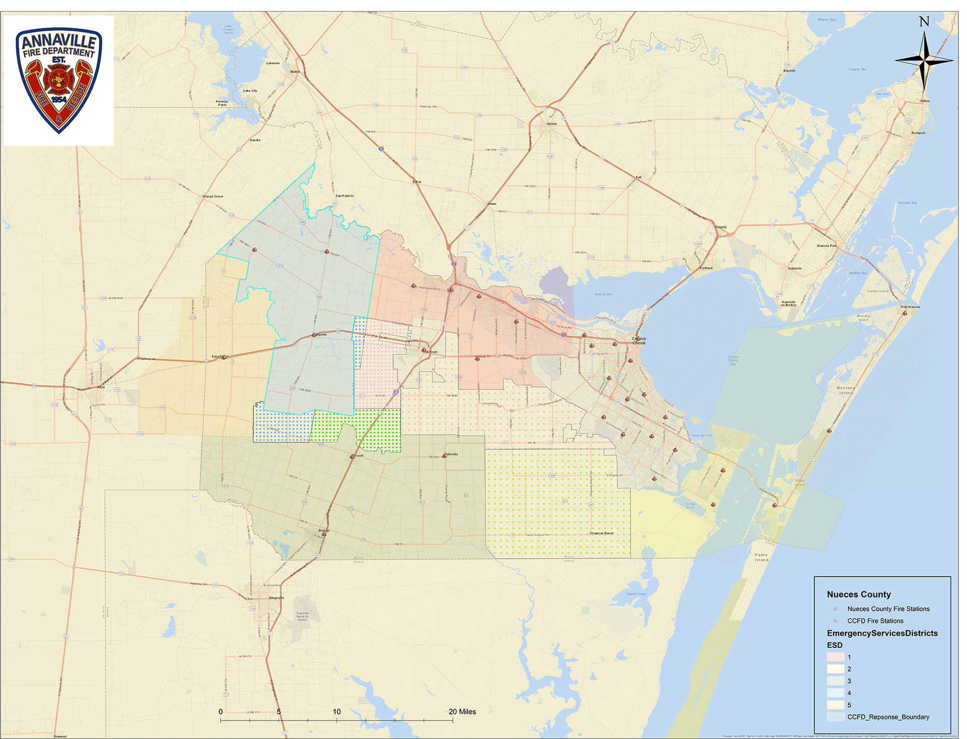 Map of a city area with colored districts, roads, and a coastline on the right.