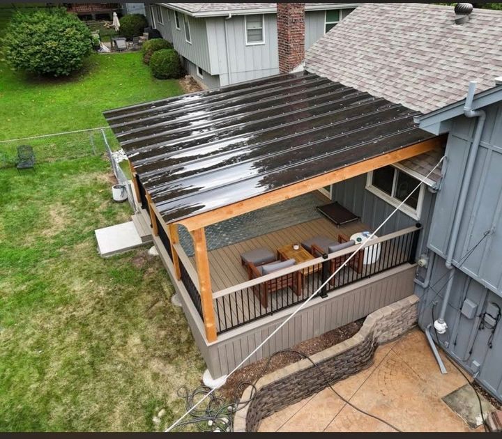 The back of a house with a deck and stairs