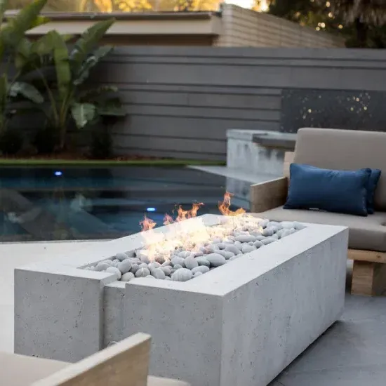 Backyard fire pit construction in Ogden UT providing a cozy outdoor focal point for relaxation and gatherings