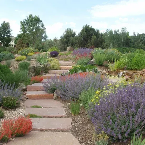 Complete outdoor landscape installation in Ogden UT transforming lawns and garden spaces with custom designs