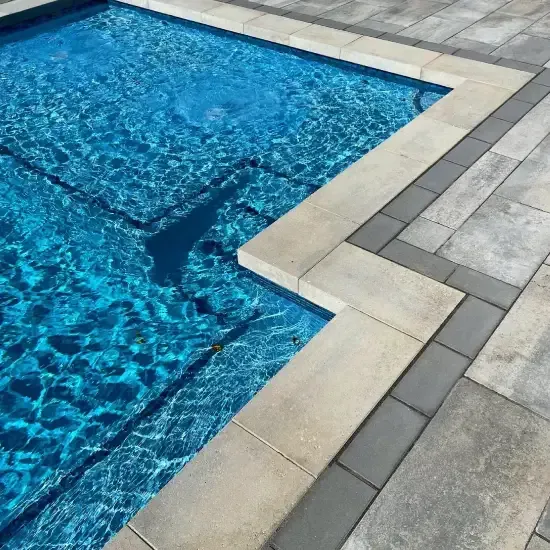 Custom backyard swimming pool design in Ogden UT creating a stylish and functional outdoor entertainment space
