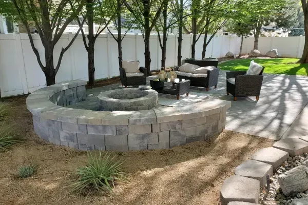 Custom fire pit installation in Ogden UT creating warm and inviting outdoor gathering spaces for homes