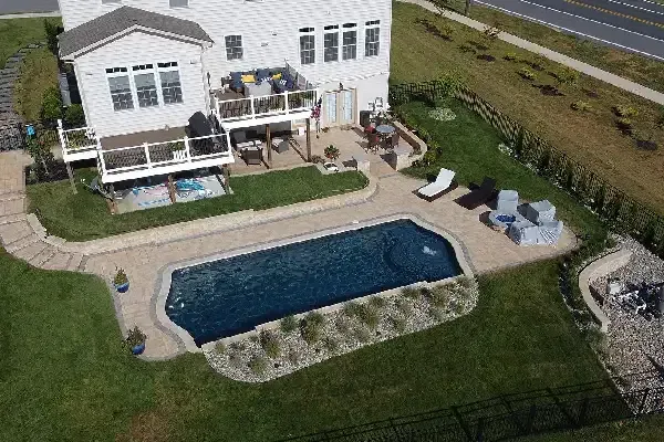 Custom pool and spa installation in Ogden UT creating luxury backyard relaxation and entertainment spaces