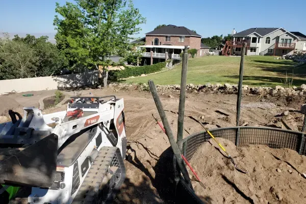 Land grading services in Ogden UT improving drainage soil leveling and site preparation for landscaping projects