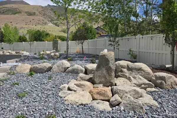 Natural decorative boulders in Ogden UT adding texture depth and visual appeal to landscape designs