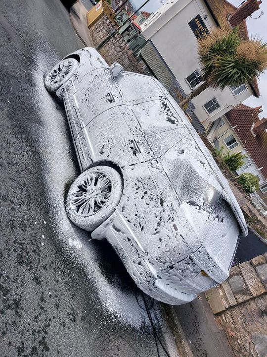 A silver range rover sport has been valeted.