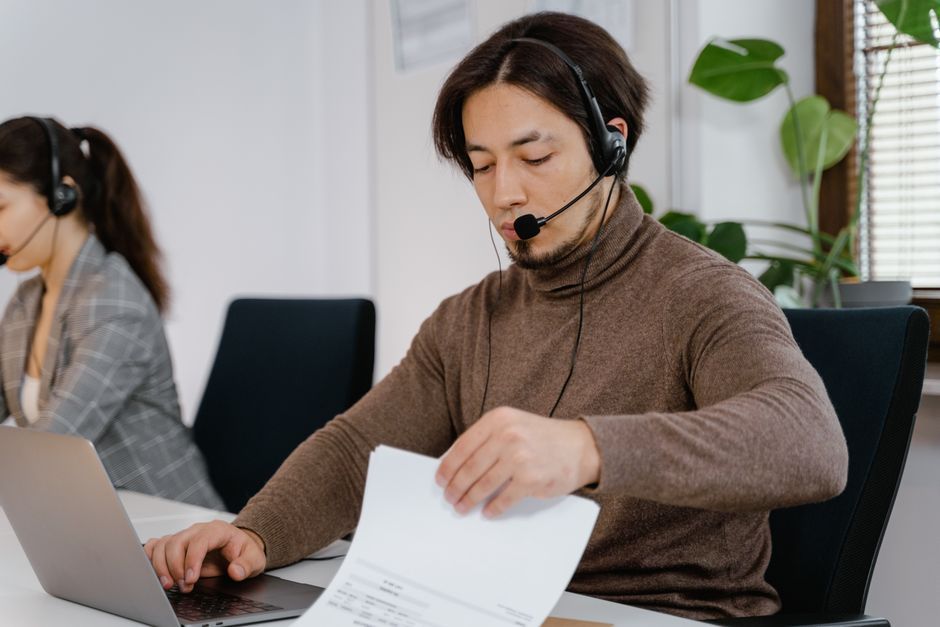 Salesperson deciding between cold calling and inbound leads for a B2B business