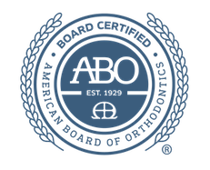 American Board of Orthodontics seal in blue and white with ABO letters and laurel wreath
