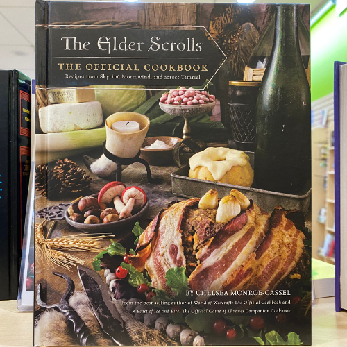 The Elder Scrolls official cookbook with various cooked foods.
