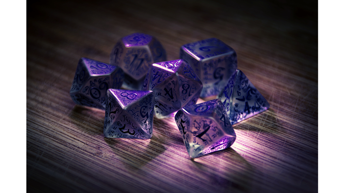 Set of clear, iridescent dice in a purple hue resting on a wooden surface.