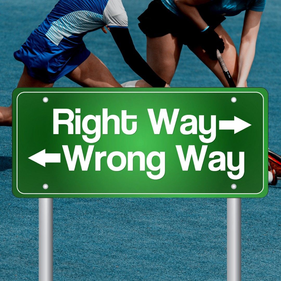 A green sign that says right way wrong way