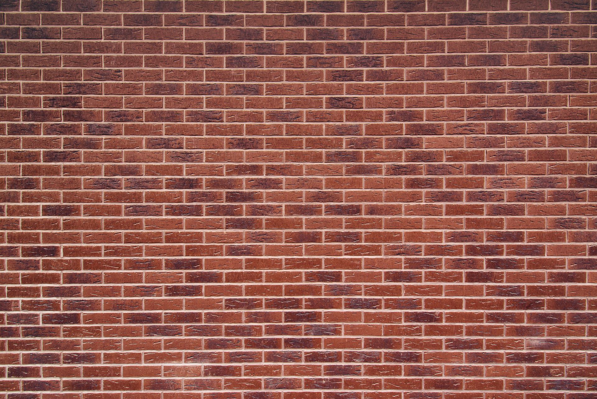 Red brick wall with aged, weathered texture. Red brick wall with aged, weathered texture.