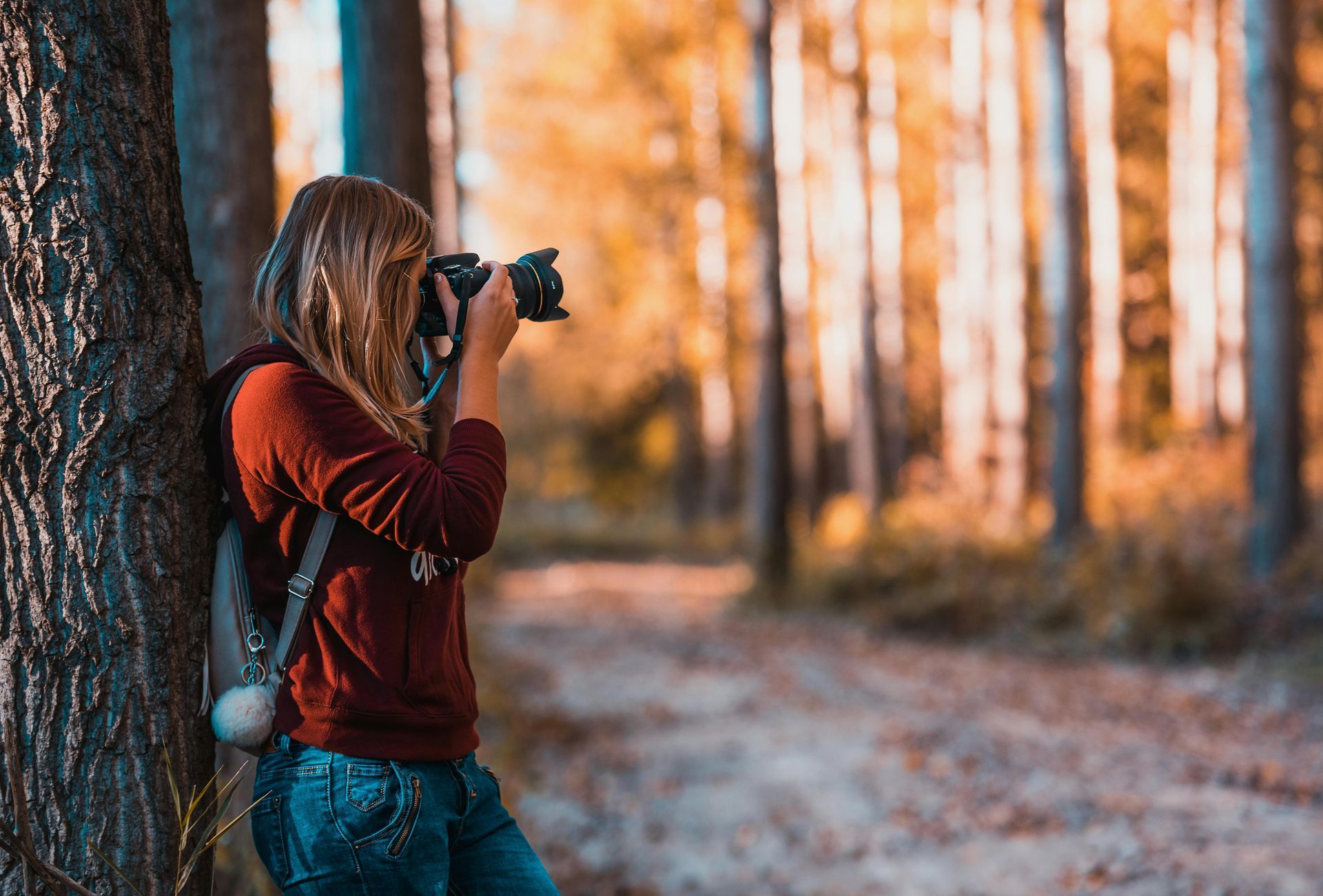 a person is holding a roll of film in their hand .