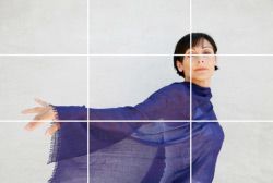 a person is holding a roll of film in their hand .