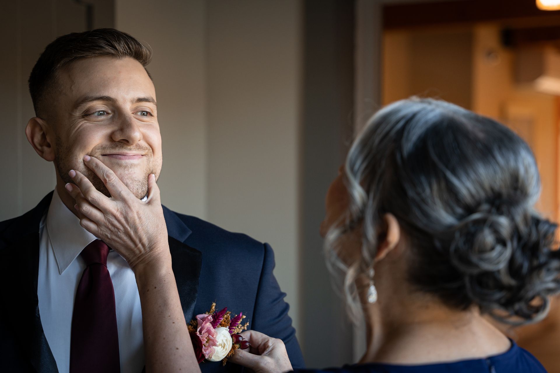 Groom and mother.