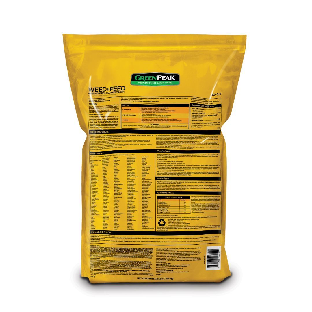 The back of a yellow bag of green peak weed and feed 